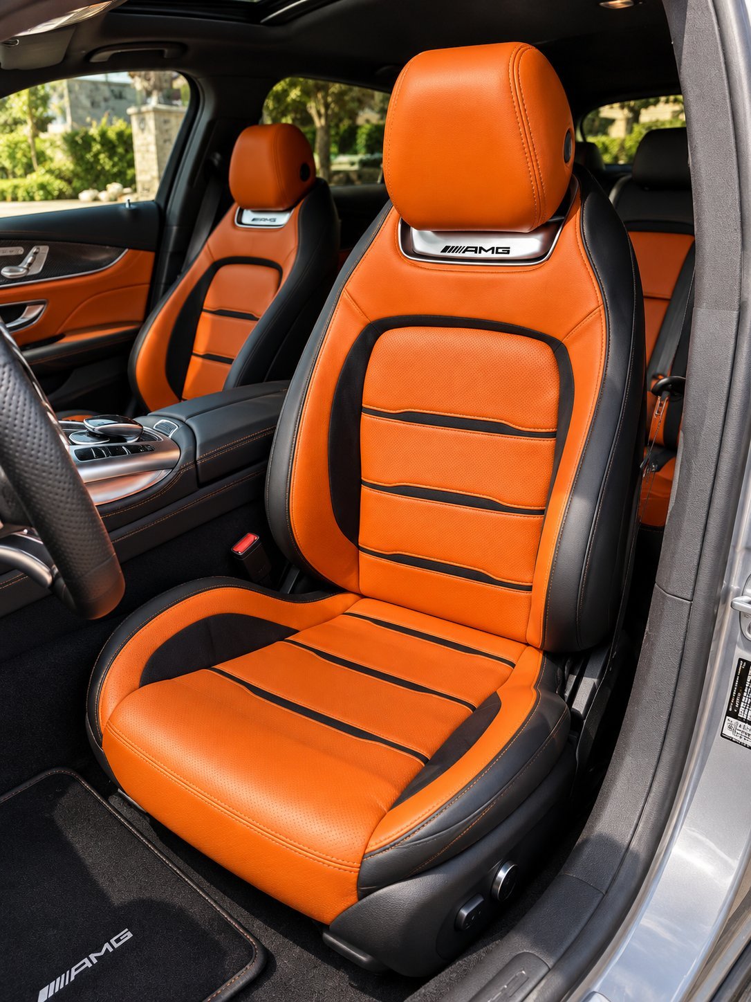 Mercedes-AMG custom orange and black leather front seat with AMG headrest badge