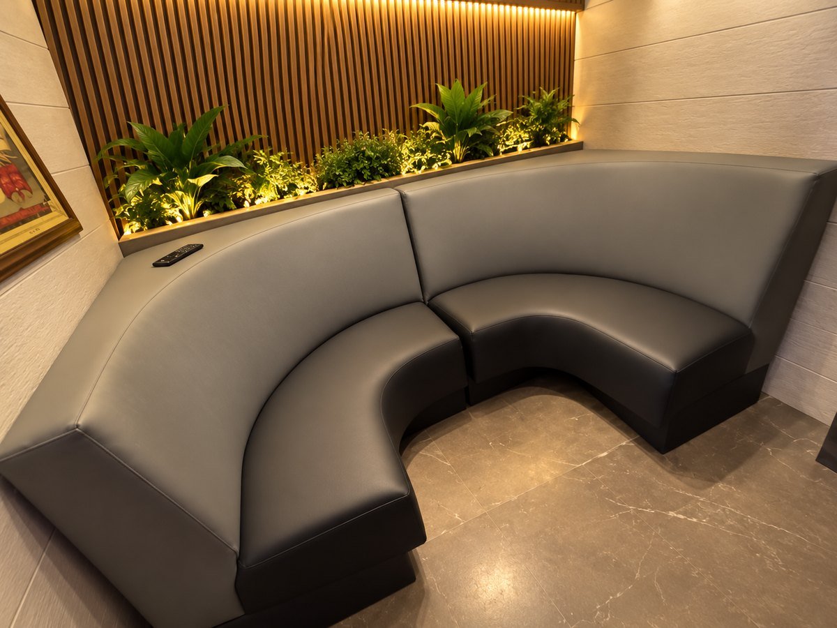 Curved cognac leather sofa with modern design
